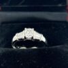 18K Gold Diamond Ring with Baguette Side Stones