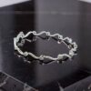 White Gold Wavy Diamond Bangle Bracelet
